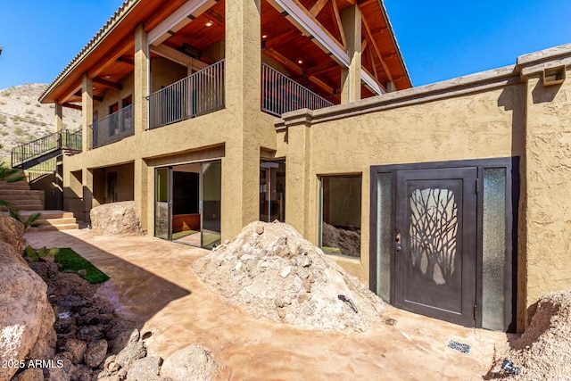 8752 E Range Rider Trl, Mesa, AZ 85207 - view of exterior entry featuring stucco siding