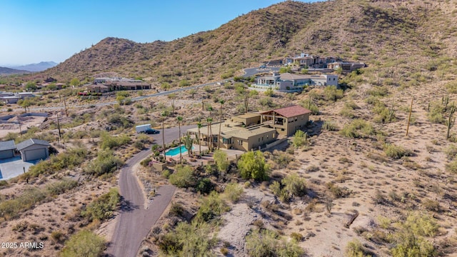 8752 E Range Rider Trl, Mesa, AZ 85207 - aerial view of property and surrounding area with mountains and a pool