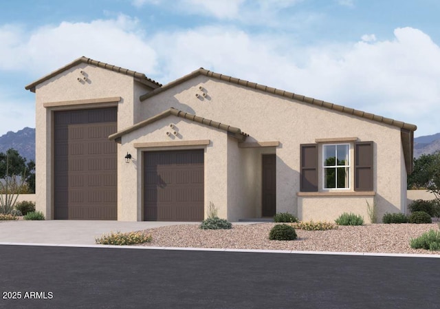 2639 E Rustler Rd, San Tan Valley, AZ 85140 - mediterranean / spanish home featuring an attached garage, concrete driveway, stucco siding, and a mountain view