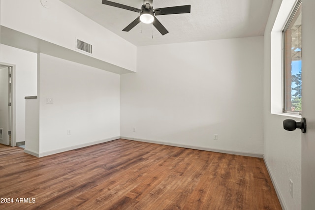 unfurnished room featuring ceiling fan and wood-type flooring