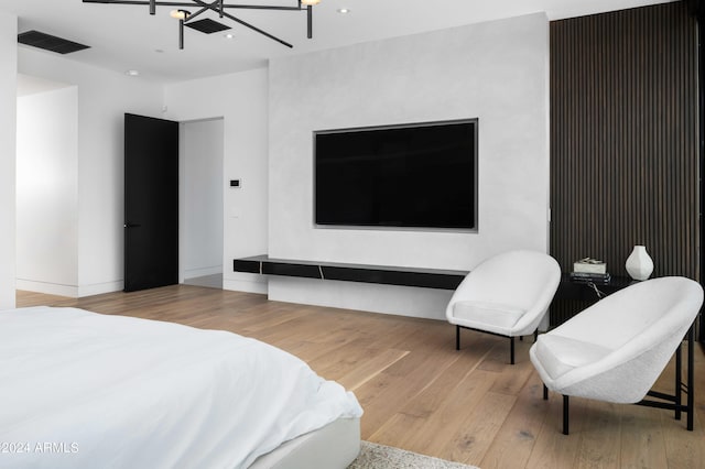 bedroom featuring recessed lighting, visible vents, and hardwood / wood-style floors