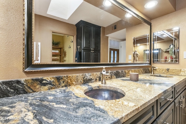 bathroom with vanity