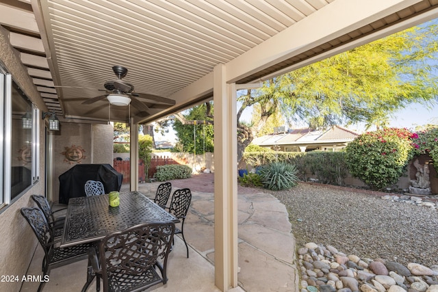 view of patio featuring grilling area and ceiling fan