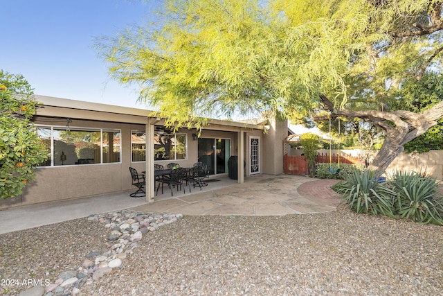 back of property featuring a patio area