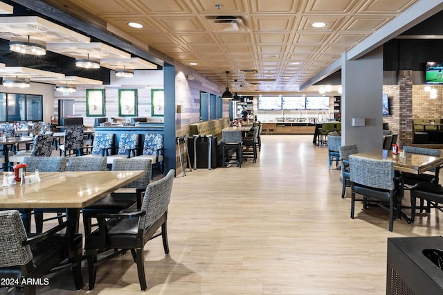 dining space featuring light wood-type flooring