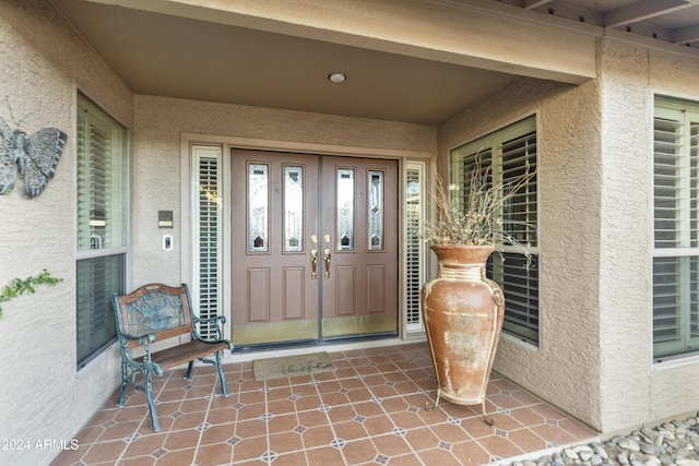 entrance to property with a porch