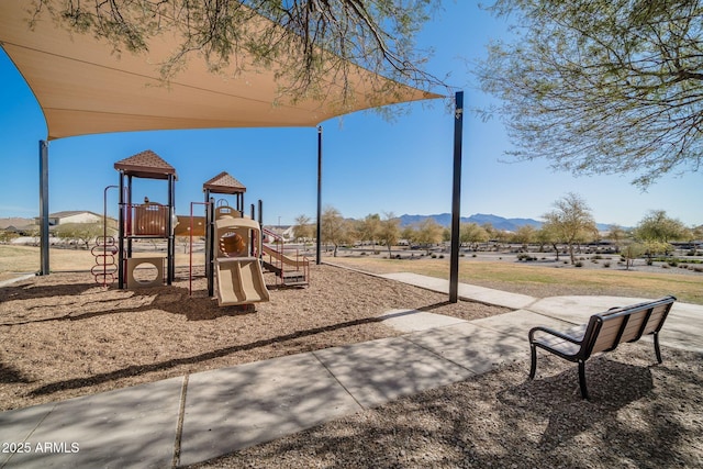 community play area with a mountain view