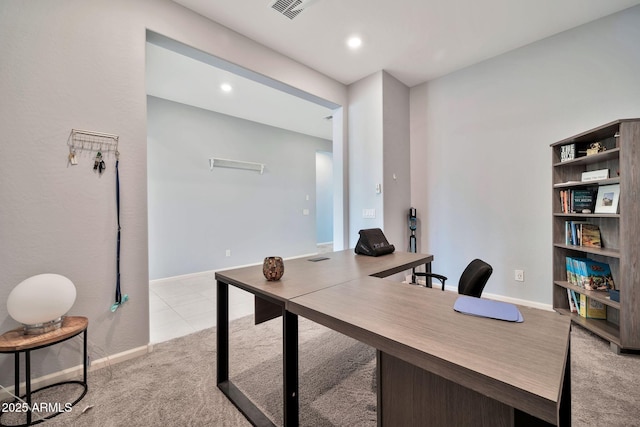 office space featuring recessed lighting, visible vents, light carpet, and baseboards