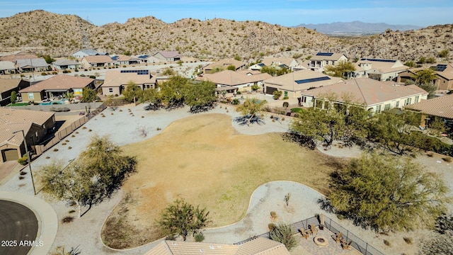 birds eye view of property featuring a residential view and a mountain view