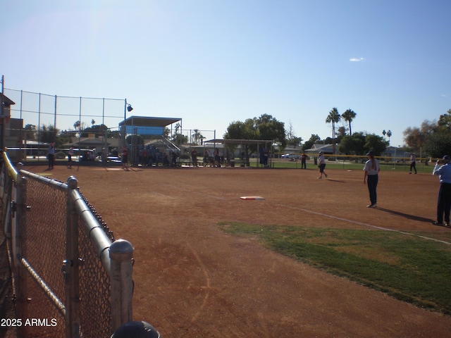 view of home's community with fence