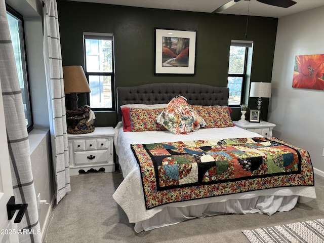 bedroom featuring carpet and a ceiling fan