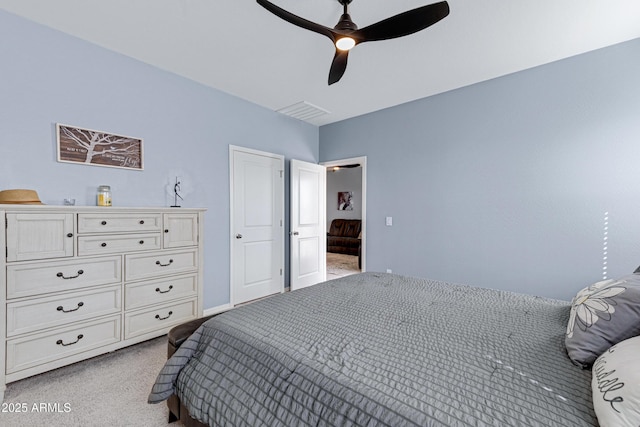 bedroom with a ceiling fan, light carpet, and visible vents
