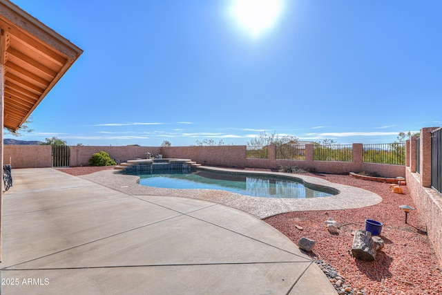 view of pool with an in ground hot tub and a patio area