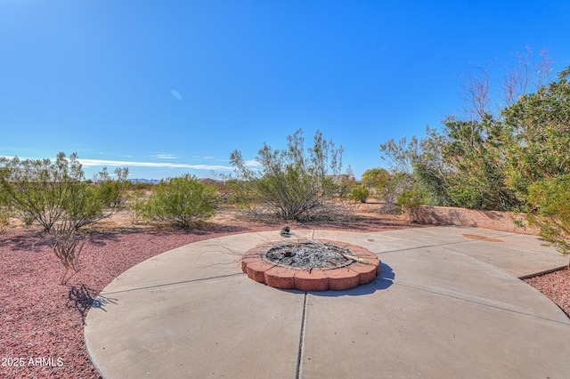 view of patio featuring a fire pit