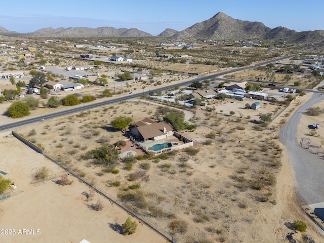 drone / aerial view featuring a mountain view