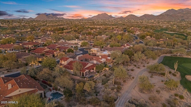 aerial view at dusk with a mountain view