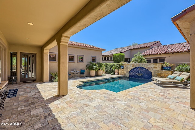 view of swimming pool featuring a fenced in pool and a patio