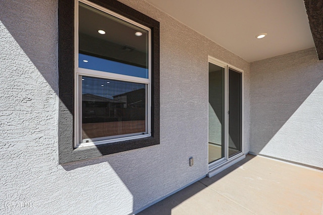 exterior space featuring stucco siding