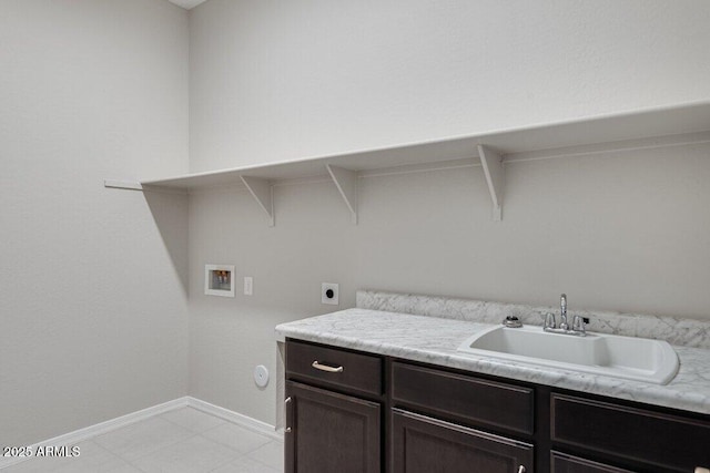 washroom with gas dryer hookup, sink, cabinets, washer hookup, and hookup for an electric dryer