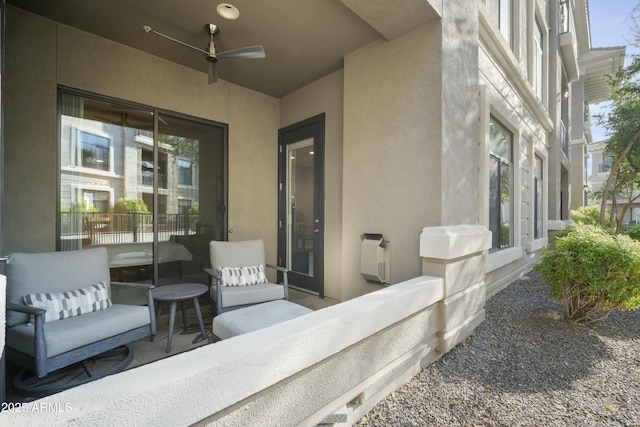 view of patio featuring ceiling fan