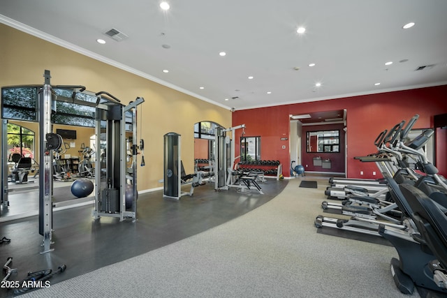 workout area with recessed lighting, visible vents, and crown molding