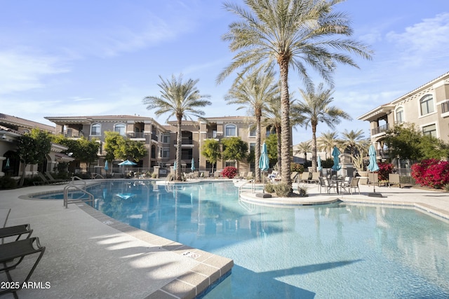 community pool featuring a patio area