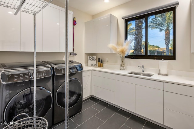 9148 N 66th Pl, Paradise Valley, AZ 85253 - laundry room featuring washer and dryer, cabinet space, and dark tile patterned floors