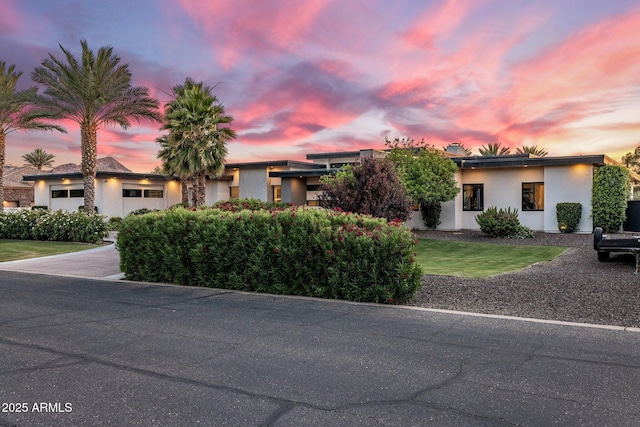 9148 N 66th Pl, Paradise Valley, AZ 85253 - view of front of home with stucco siding and a lawn