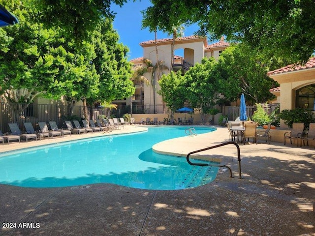 view of pool with a patio