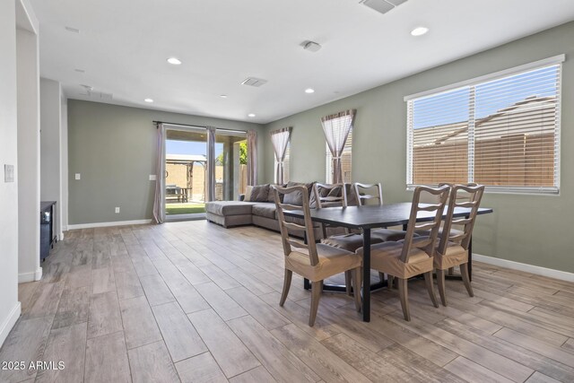 6919 S 13th Pl, Phoenix, AZ 85042 - dining room featuring light wood-style flooring and recessed lighting