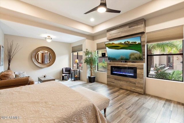 bedroom featuring ceiling fan and light wood-type flooring