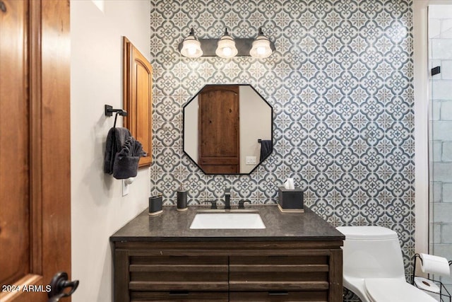 bathroom with vanity and toilet