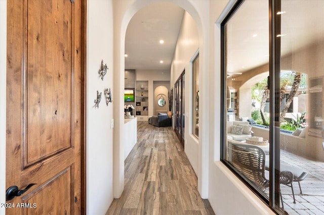 corridor featuring hardwood / wood-style flooring