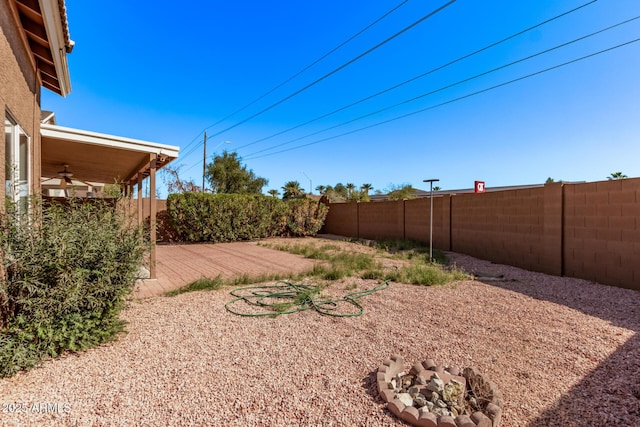 view of yard with a patio and a fenced backyard