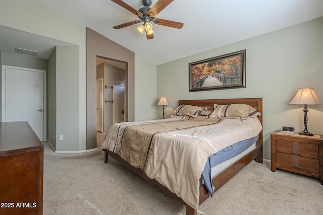 carpeted bedroom with lofted ceiling and ceiling fan