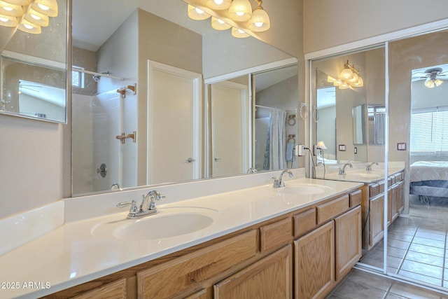 bathroom featuring tile patterned flooring, vanity, lofted ceiling, and walk in shower