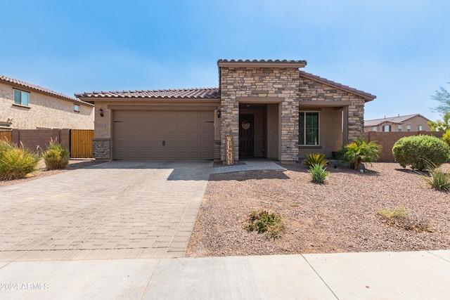 view of front of house with a garage