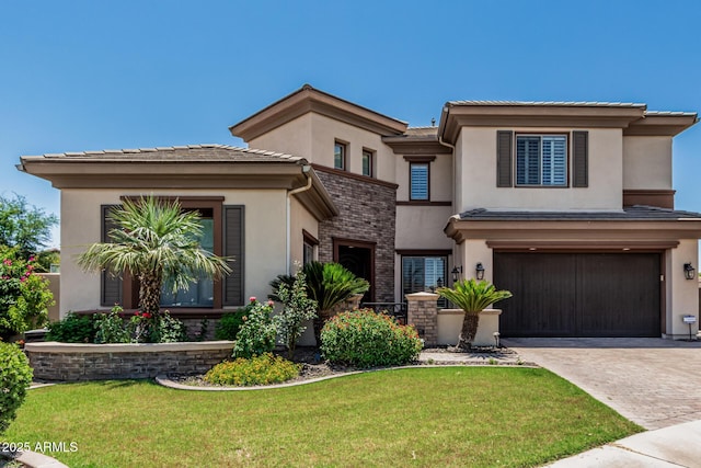 4463 S Oregon Ct, Chandler, AZ 85248 - view of front of house with stucco siding, decorative driveway, a garage, and a front yard