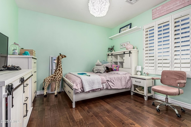 4463 S Oregon Ct, Chandler, AZ 85248 - bedroom featuring dark wood-type flooring, a chandelier, and baseboards