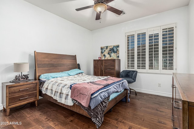 4463 S Oregon Ct, Chandler, AZ 85248 - bedroom with dark wood-style flooring, baseboards, and ceiling fan