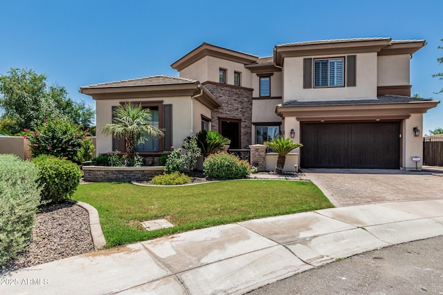 4463 S Oregon Ct, Chandler, AZ 85248 - view of front of home featuring stucco siding, driveway, an attached garage, and a front yard