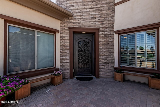 4463 S Oregon Ct, Chandler, AZ 85248 - property entrance with stucco siding and brick siding