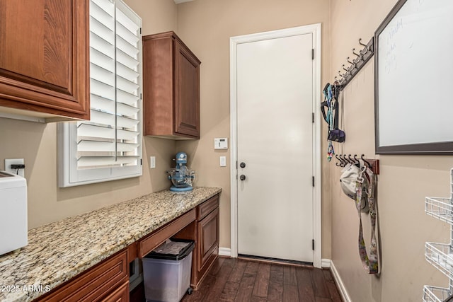 4463 S Oregon Ct, Chandler, AZ 85248 - laundry room featuring dark wood-style floors, baseboards, cabinet space, and plenty of natural light