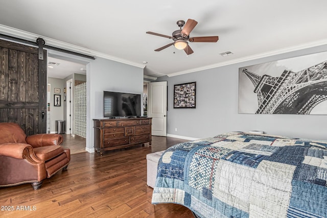 4463 S Oregon Ct, Chandler, AZ 85248 - bedroom featuring wood finished floors, crown molding, baseboards, a barn door, and ceiling fan