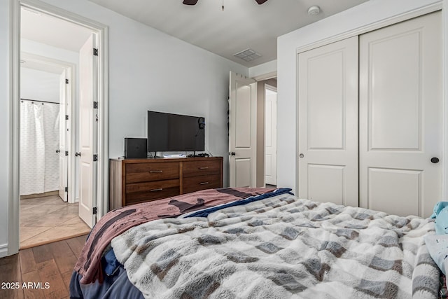 4463 S Oregon Ct, Chandler, AZ 85248 - bedroom with hardwood / wood-style flooring, a closet, and a ceiling fan