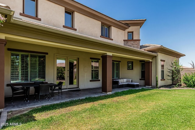 4463 S Oregon Ct, Chandler, AZ 85248 - back of property with stucco siding, a lawn, a patio, an outdoor hangout area, and a chimney