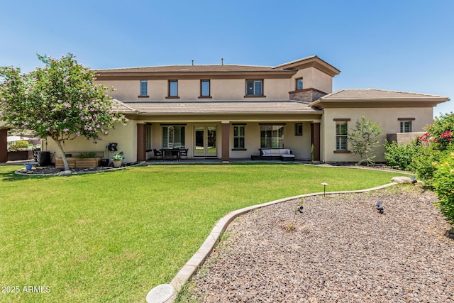 4463 S Oregon Ct, Chandler, AZ 85248 - back of house featuring stucco siding, french doors, outdoor lounge area, a yard, and a patio area