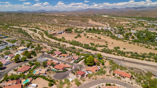 drone / aerial view featuring a mountain view