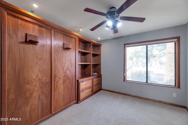 unfurnished bedroom with light carpet