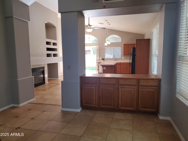 351 S Apache Dr, Chandler, AZ 85224 - kitchen with freestanding refrigerator, a sink, plenty of natural light, a ceiling fan, and lofted ceiling